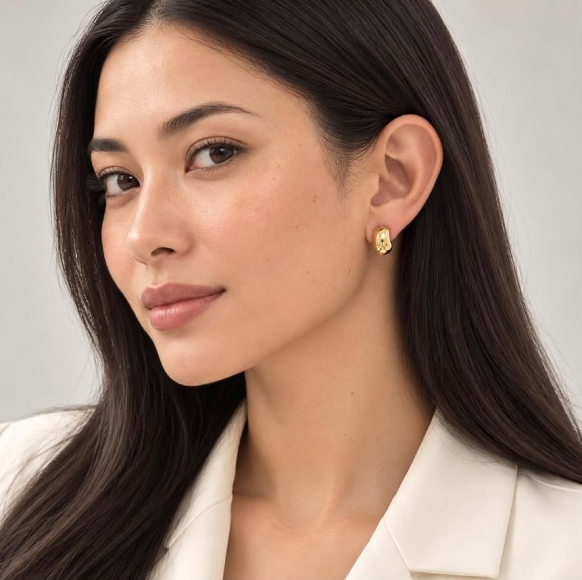Model wearing Lucia Crescent Hoops